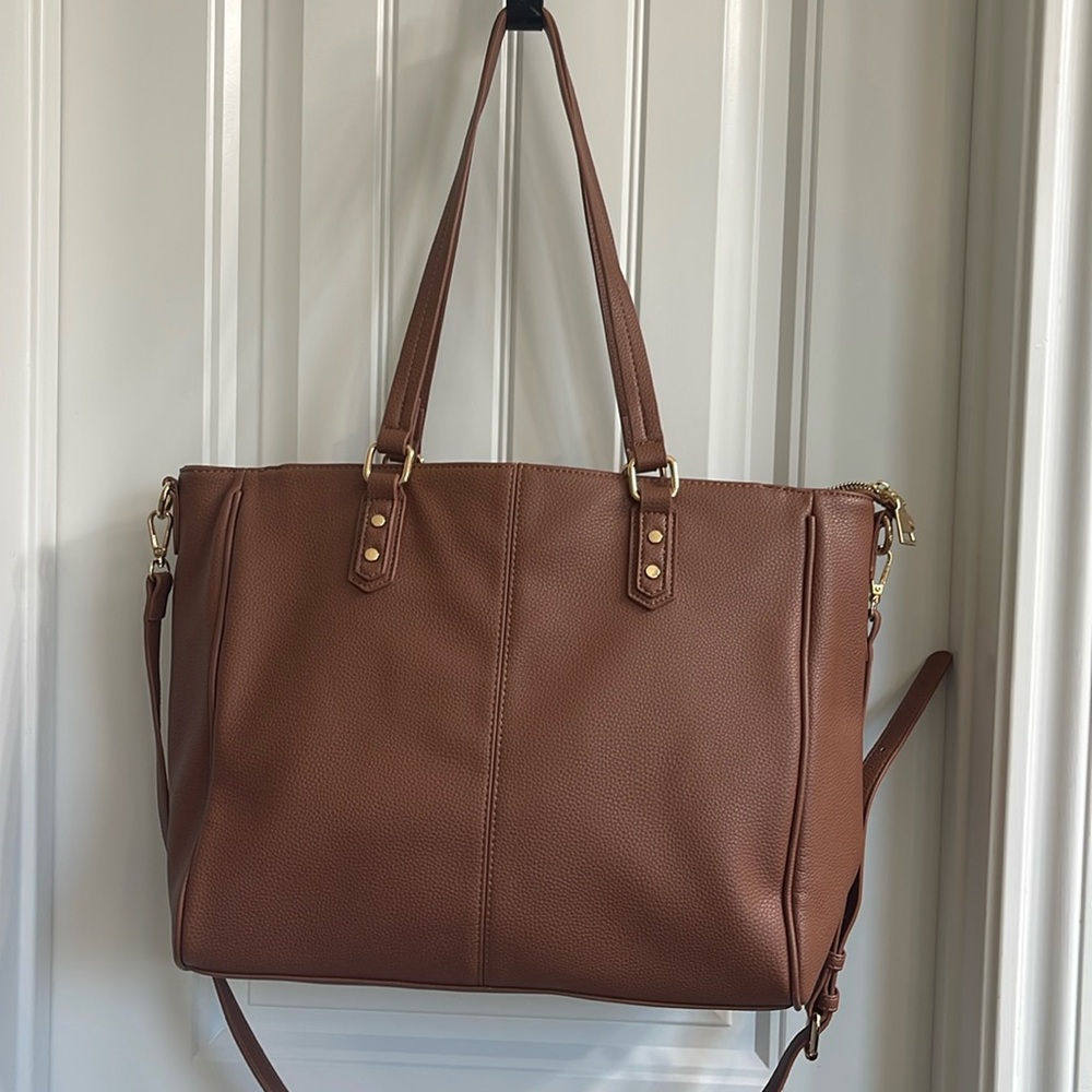 Like new tan, Miztique bag.